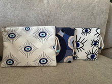 Load image into Gallery viewer, Large zippered lucky eye wristlet