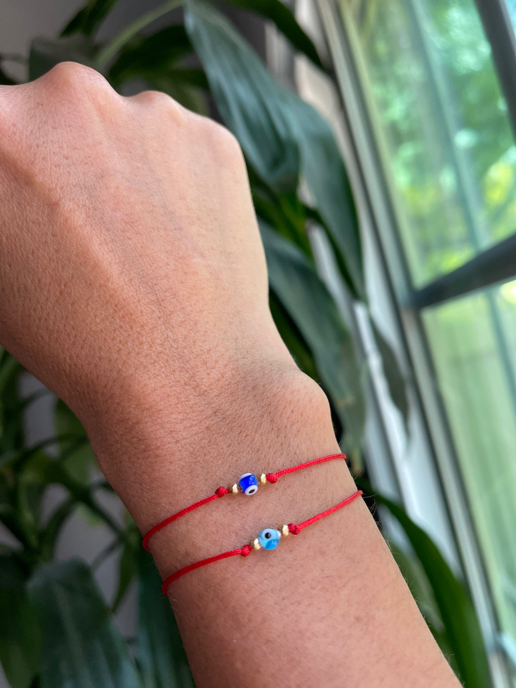 Red string adjustable protection bracelet