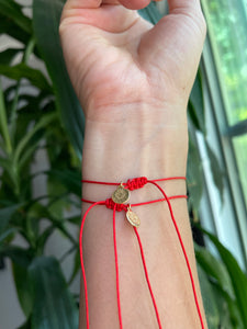 Red string adjustable protection bracelet